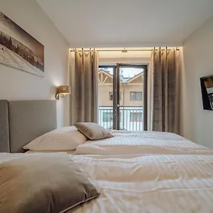 https://apartament-silence-karpatia-resort-z-kominkiem.karpacz-hotel.com